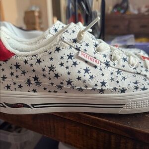 Skechers White Sneakers with Navy Stars